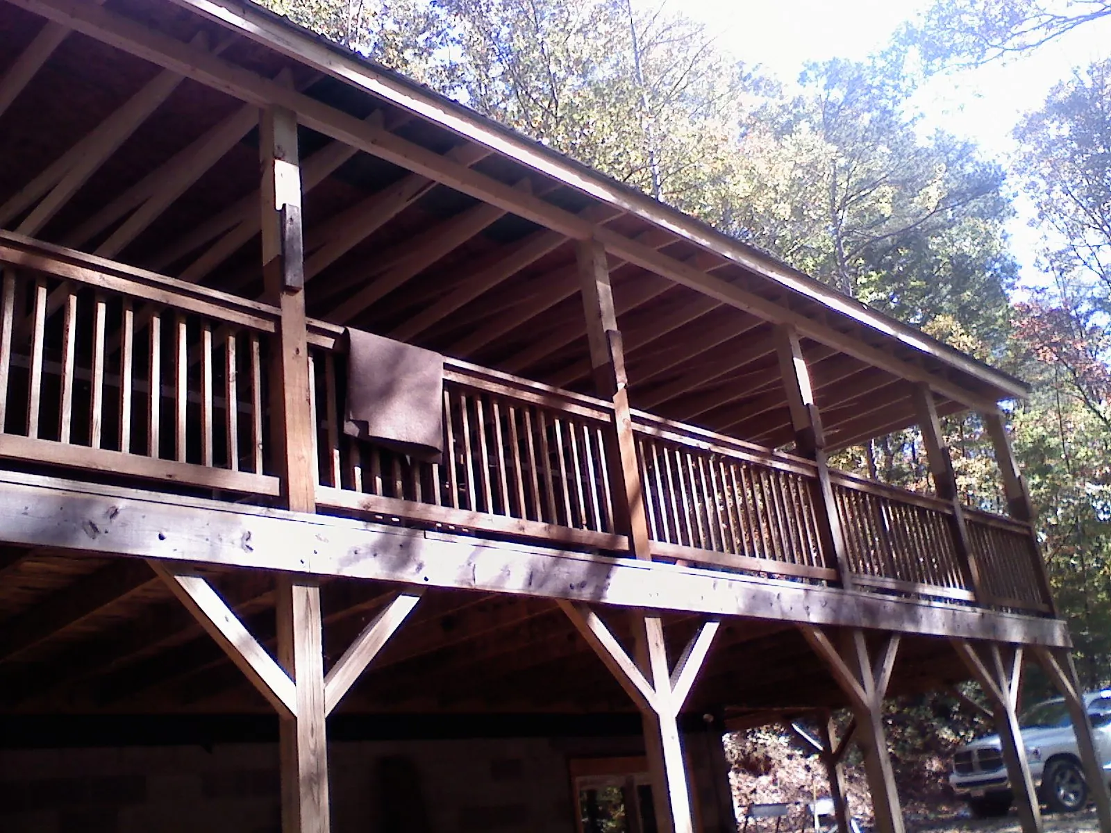 Timber framing under a new elevated porch and deck — Roof Leak Repair in Corning by Roofing Brothers
